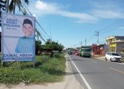 Baliho H. Zainal Abidin Dengan Tagline Arah Baru Polewali Mandar Tersebar di Ruas Jalan Bumi Tipalayo.