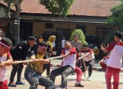Polres Polman Gelar Lomba Tarik Tambang dan Lari Karung Sambut HUT RI ke-80