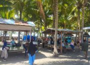 Bhabinkamtibmas Polsek Campalagian Laksanakan Pengamanan di Objek Wisata Pantai Ba’batoa