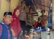 Kapolsek Binuang Hadiri Penyerahan Bantuan Sosial Pemerintah Kabupaten Polman di Kecamatan Binuang