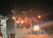 Kapolsek Tapango Pimpin Pengamanan Takbiran Keliling dan Pawai Obor di Dusun Rurabolong