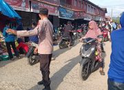 Pengamanan dan Pengaturan Lalu Lintas di Pasar Pelitakan, Polsek Tapango Pastikan Arus Lancar