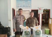 Bhabinkamtibmas Desa Kunyi Pantau Penyaluran Bantuan Pangan Tahun 2026