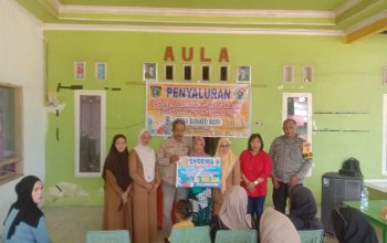 Bhabinkamtibmas Polsek Tapango Kawal Penyaluran BLT di Desa Banatorejo, Berjalan Aman dan Lancar