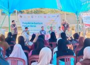 Kapolsek Tutar Hadiri Penyaluran Bantuan Pangan Beras Bulog di Desa Ambopadang