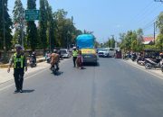 Jam Pulang Sekolah, Sat Lantas Polres Polman Hadir Atur Arus Lalu Lintas