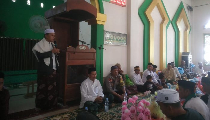 Bhabinkamtibmas Desa Kuajang Hadiri Peringatan Maulid Nabi Muhammad SAW